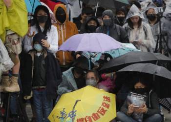 Police accuse Hong Kong protesters of inciting minors to commit crimes