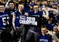 On anniversary of Sandy Hook taking pictures, Newtown high school wins football championship