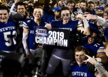 On anniversary of Sandy Hook taking pictures, Newtown high school wins football championship