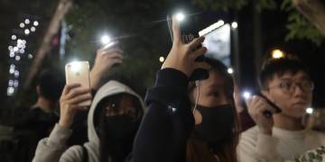 Bricks and tear gasoline: Hong Kong police, protesters clash as Carrie Lam visits Beijing