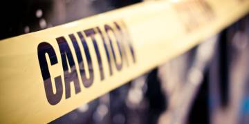 Hazardous green slime oozes out of facility, onto Detroit freeway, police say