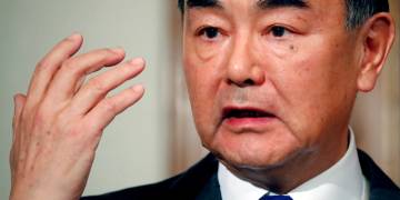 China’s top diplomat acknowledges COVID-19 problem, criticizes ‘overreaction’