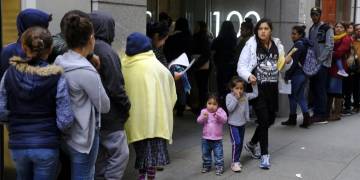 Trump rules restricting green cards for people who use public benefits takes effect