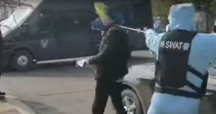 Watch a Chinese SWAT team practice taking down a coronavirus-infected man