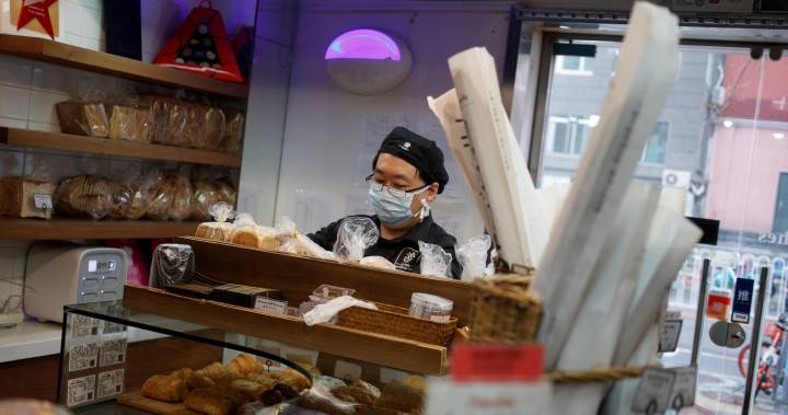 China sees cautious return to work after weeks of disruption due to COVID-19