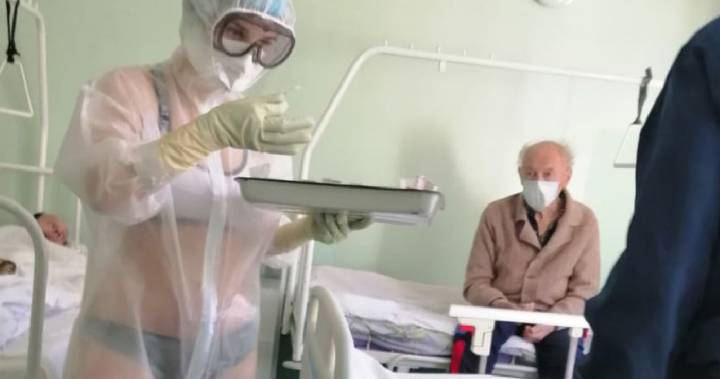 COVID-19 nurse with swimsuit under her gown exposes PPE issues in Russia
