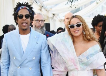 Video: Jay Z, Beyonce Sit During National Anthem At Super Bowl