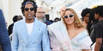 Video: Jay Z, Beyonce Sit During National Anthem At Super Bowl